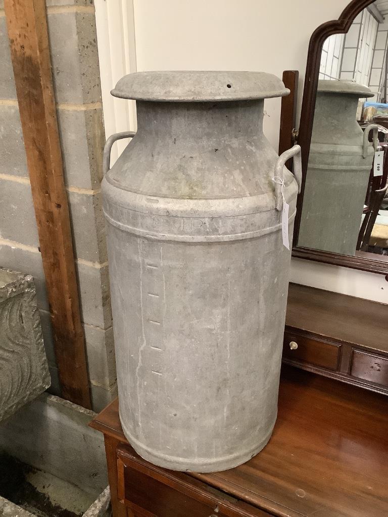 A vintage galvanised milk churn, height 70cm